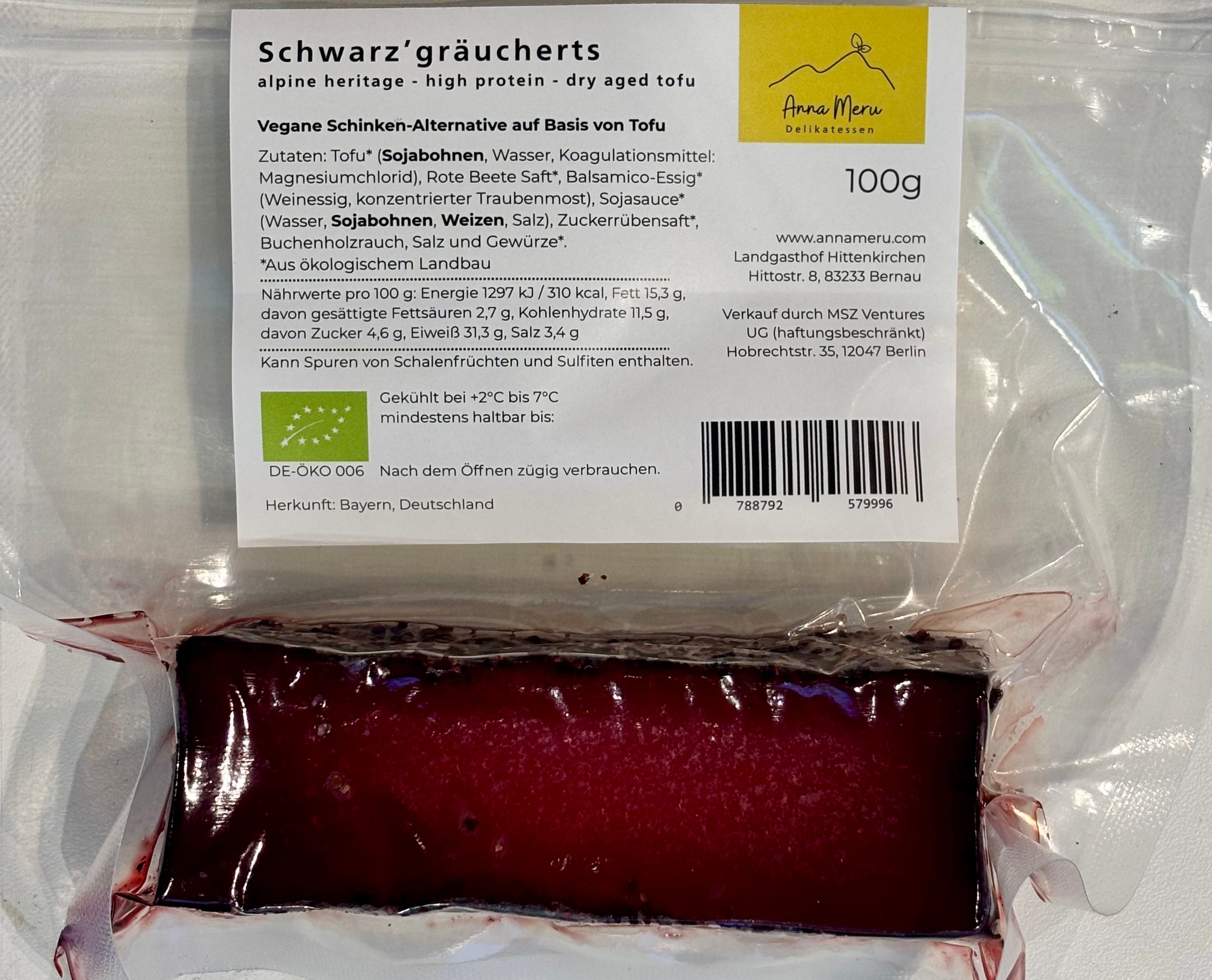 Back of the packaging for Anna Meru Alpine Smoked Vegan Block, detailing its organic ingredients and high-protein nutritional information.