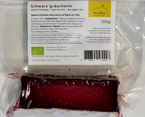 Back of the packaging for Anna Meru Alpine Smoked Vegan Block, detailing its organic ingredients and high-protein nutritional information.