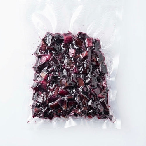 A 250g and 100g vacuum-sealed package of Anna Meru Alpine Smoked Vegan Cubes, a healthy and natural clean-label ingredient.